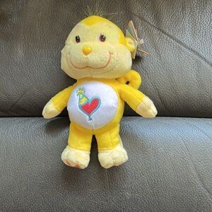 Care Bear Yellow playful heart monkey plush